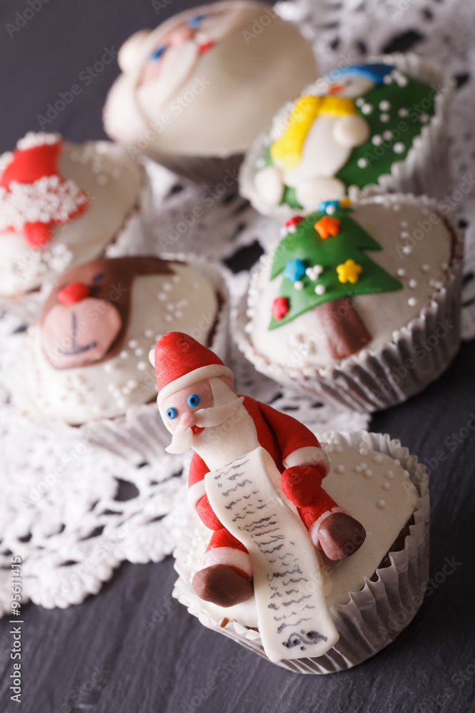 Beautiful Christmas cupcakes closeup. vertical