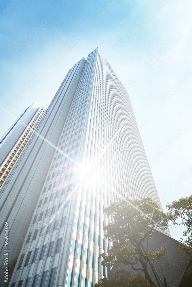 Obraz premium Shining business building/It has received a glowing light of the sun
