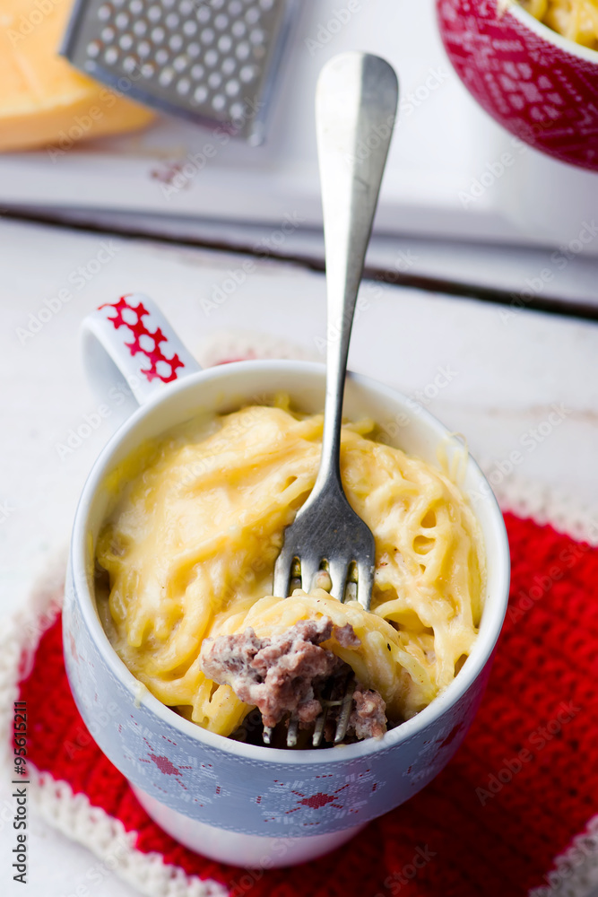 spaghetti in a mug prepared in microwave Stock Photo Adobe Stock
