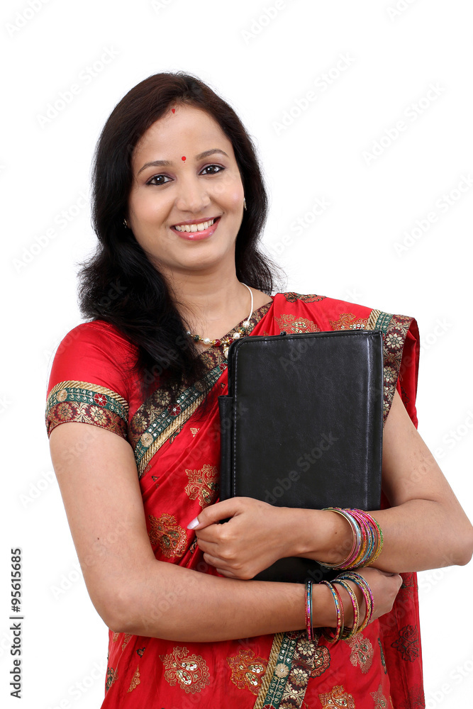 Traditional Indian woman using a tablet computer Traditional Indian woman using a tablet computer