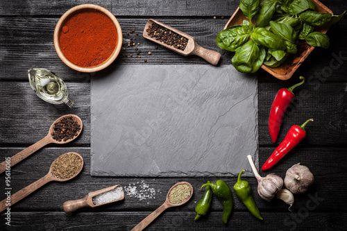Fototapeta Naklejka Na Ścianę i Meble -  Stone board with different spices