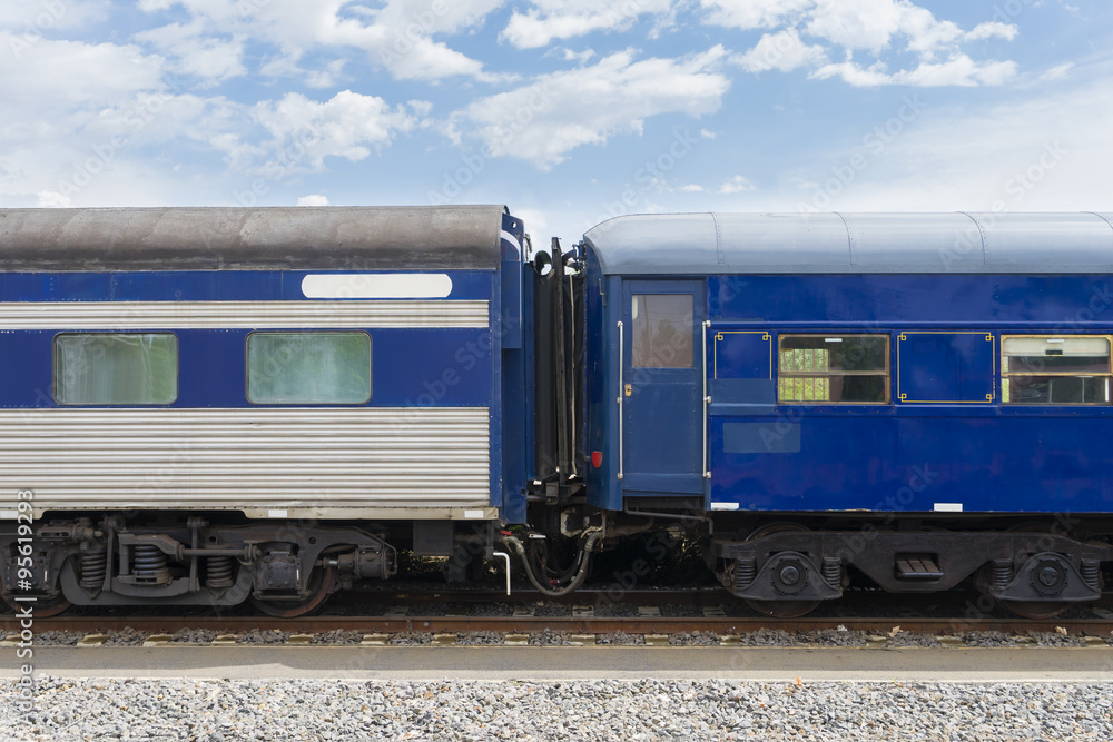 Obraz premium Close-up of carriages of passenger train in blue