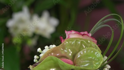 creating a flower arrangement shaped as a cake photo