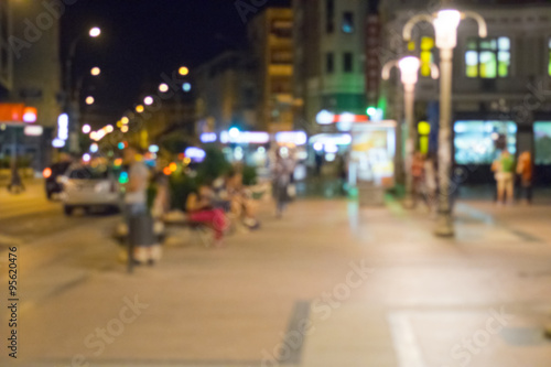 abstract blurred background of people walking in city center