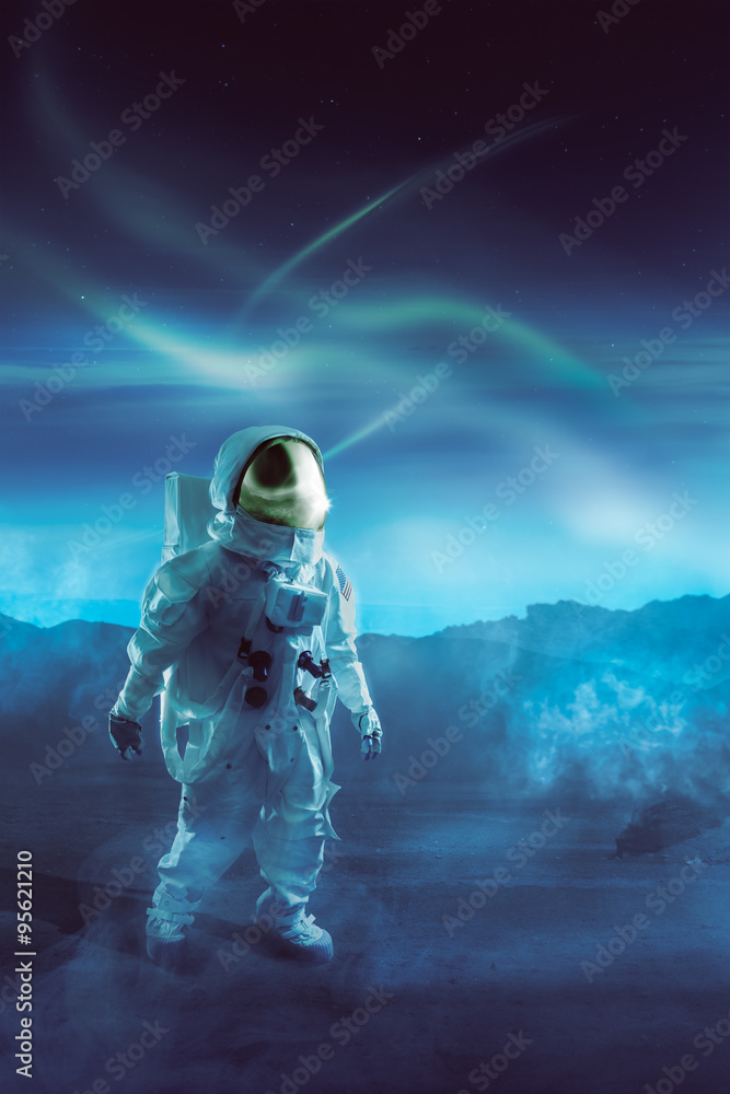 Fototapeta premium Astronaut walking on an unexplored planet