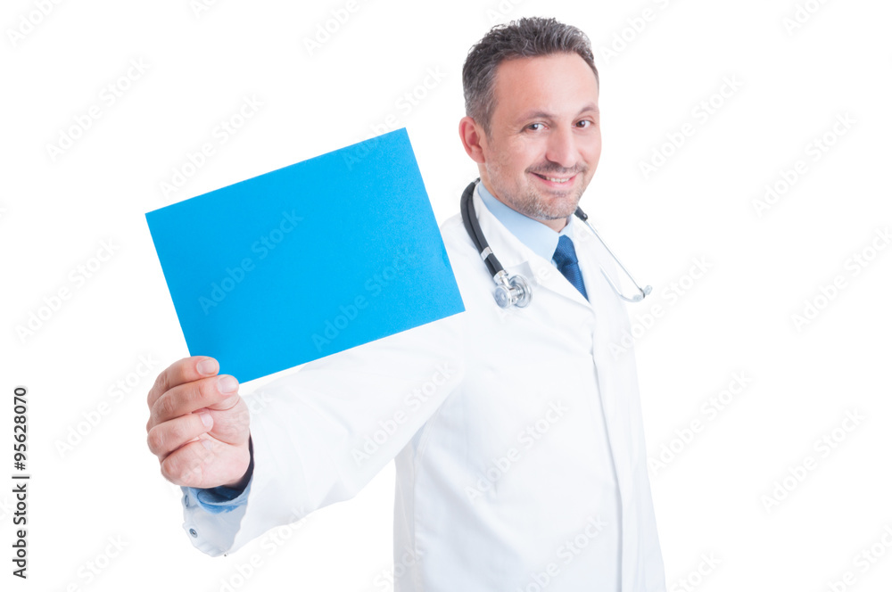 Doctor or medic holding blue blank paper with copy space Doctor or medic holding blue blank paper with copy space
