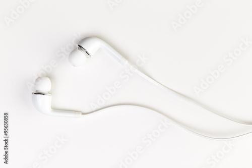 Fototapeta Naklejka Na Ścianę i Meble -  White earphones