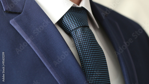 Photos jacket men's shirt with a blue tie