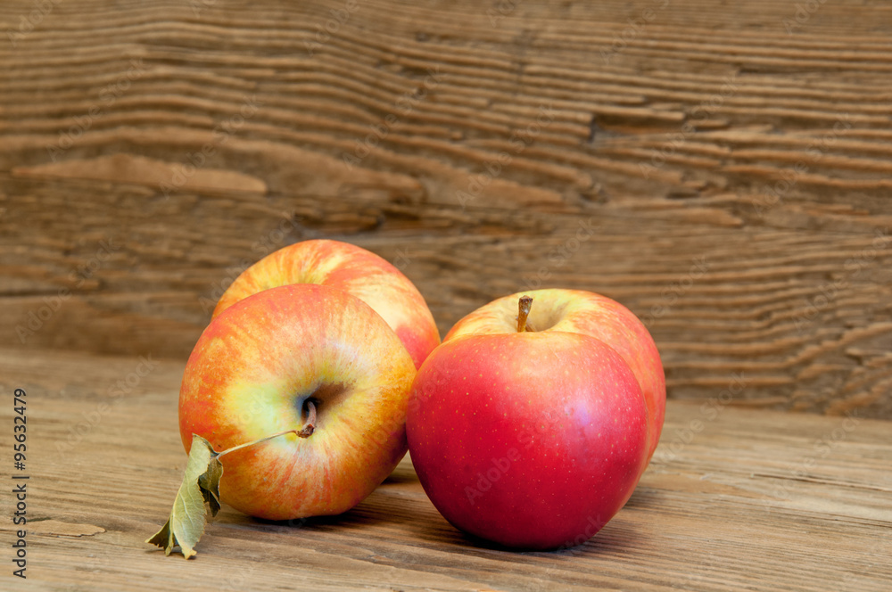 apples on a wooden background