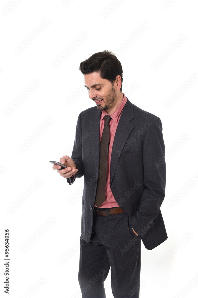 corporate portrait of young attractive businessman of Latin Hispanic ethnicity with mobile phone corporate portrait of young attractive businessman of Latin Hispanic ethnicity with mobile phone