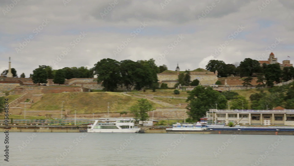 Time lapse of dramatic fast moving clouds over Belgrade with river Sava. Smooth pan from Victor monument to downtown. Time lapse of dramatic fast moving clouds over Belgrade with river Sava. Smooth pan from Victor monument to downtown.