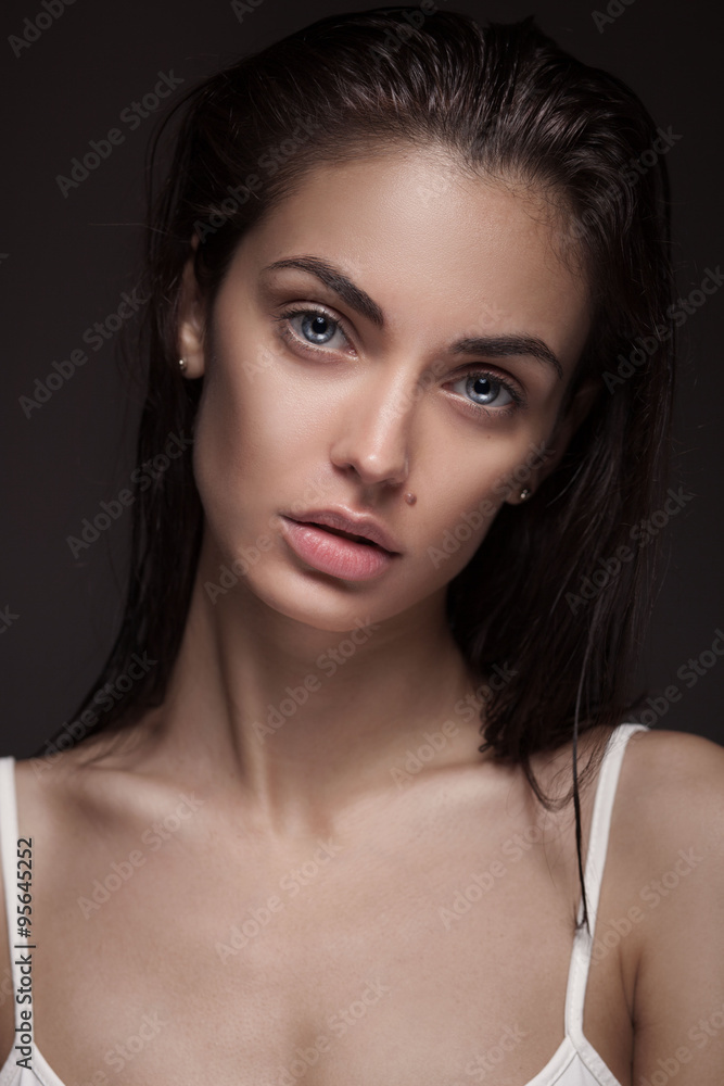 young adult woman with clean fresh skin and wet hair young adult woman with clean fresh skin and wet hair