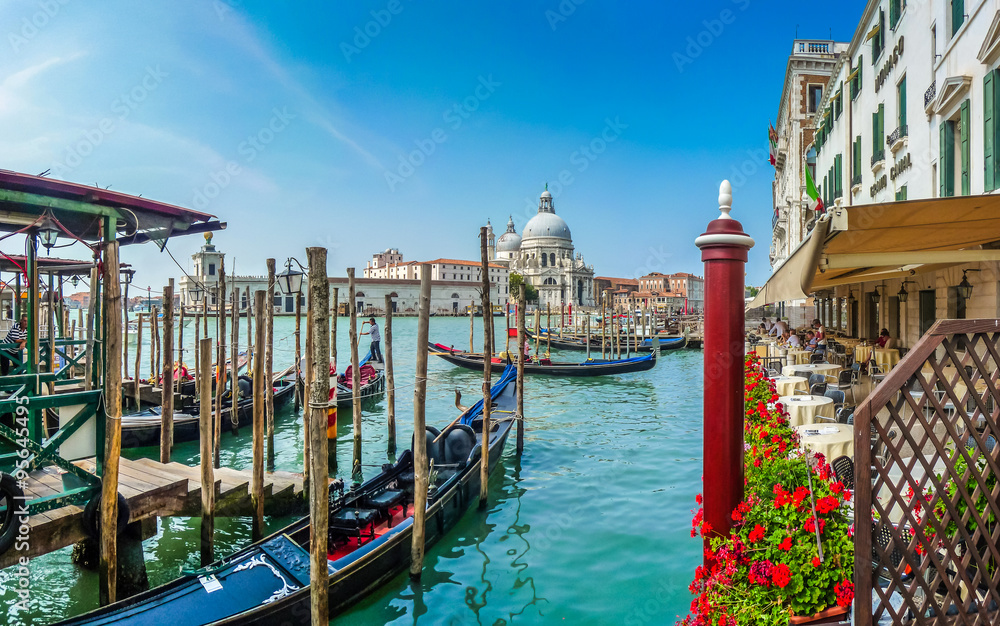 Naklejka premium Scenic view of Canal Grande with Gondolas and Basilica di Santa Maria della Salute, Venice, Italy