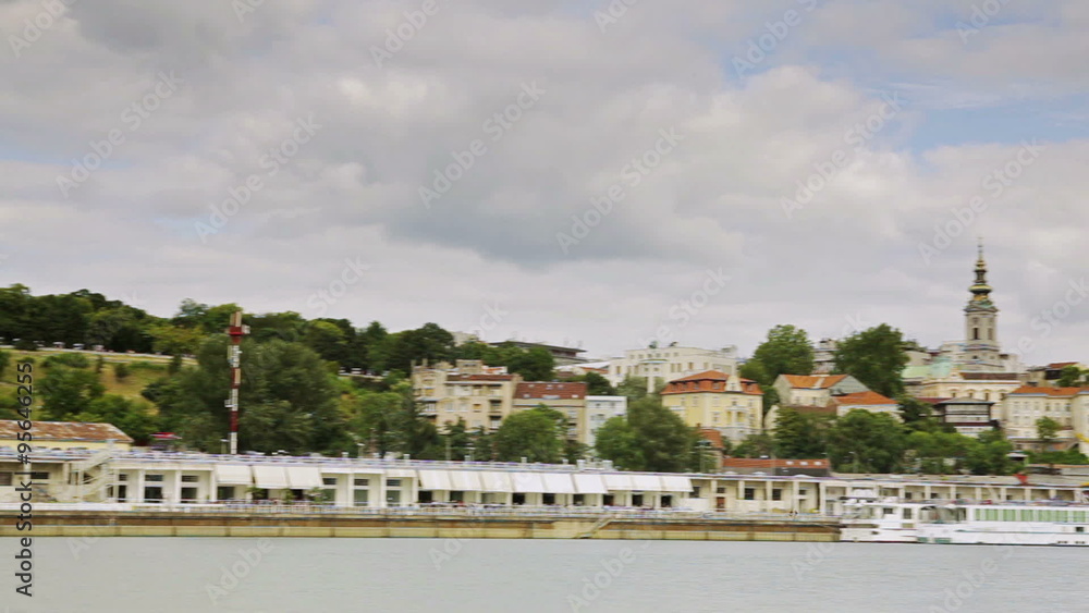 Time lapse of dramatic fast moving clouds over Belgrade with river Sava. Smooth pan from Victor monument to downtown. Time lapse of dramatic fast moving clouds over Belgrade with river Sava. Smooth pan from Victor monument to downtown.