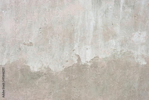 The gray concrete wall stained whitewash