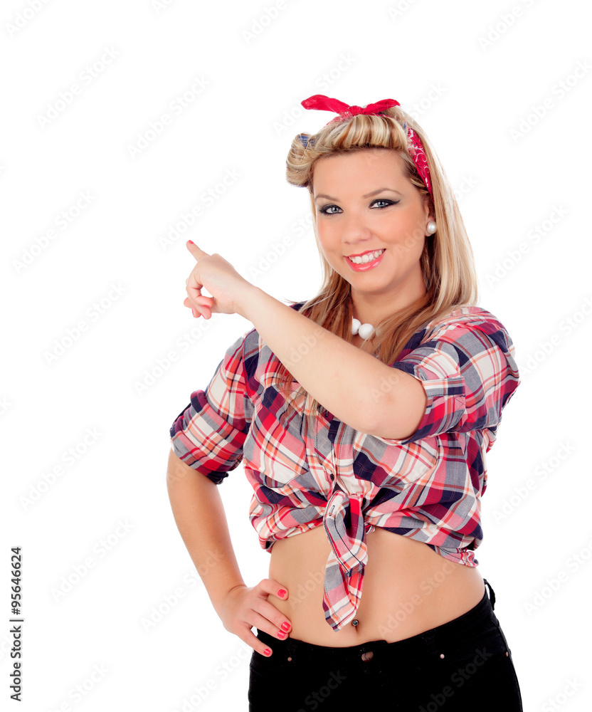 Cute girl indicating something in pinup style Cute girl indicating something in pinup style