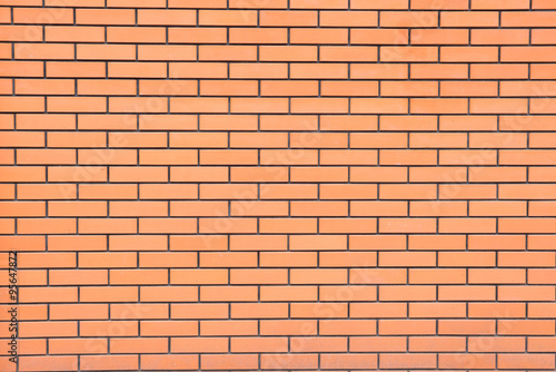 Wall of a new orange brick