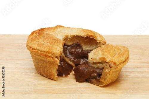 Фотография Steak pie on a board