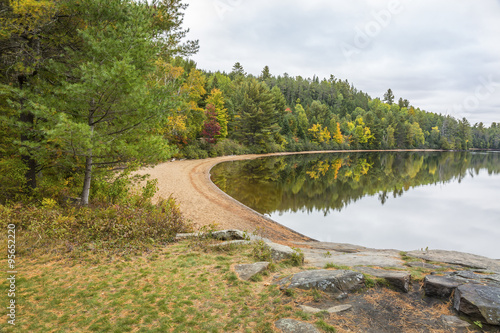 Sandy Beach on a Forested Lake in Autumn - Ontario  Canada