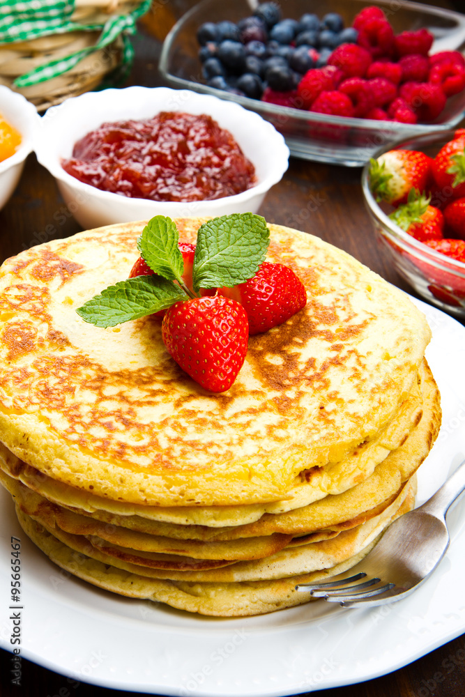 delicious pancakes on wooden table with fruits delicious pancakes on wooden table with fruits
