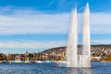 Fountain with rainbow on Zurich lake