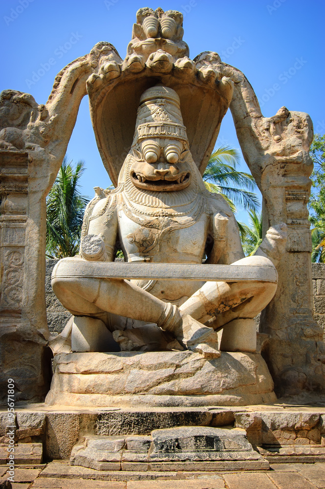 Yoga Narasimha form at a temple in Vijayanagara, Hampi, India. Visnu's ...