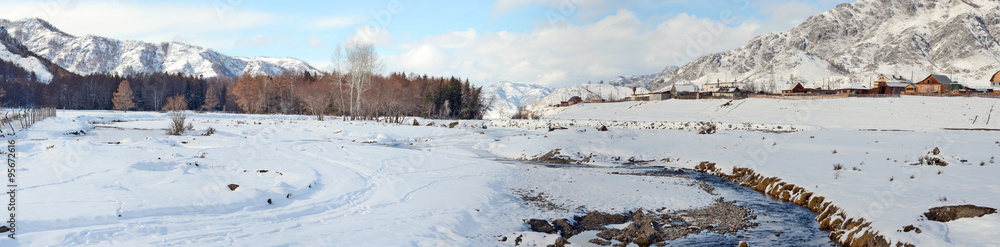 Mountain village winter brook