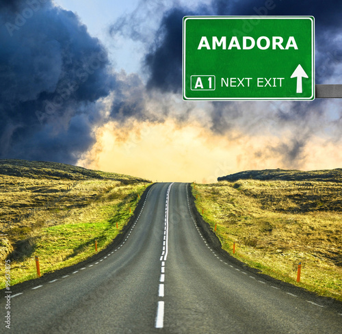 AMADORA road sign against clear blue sky photo