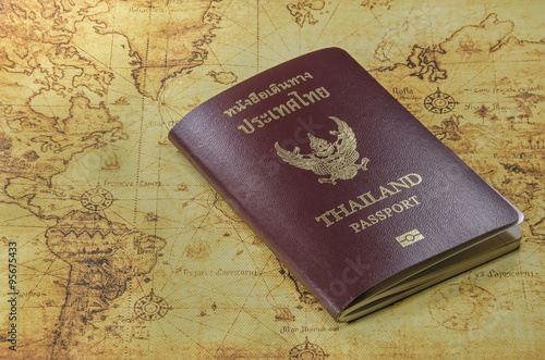 thailand passport on a old world map