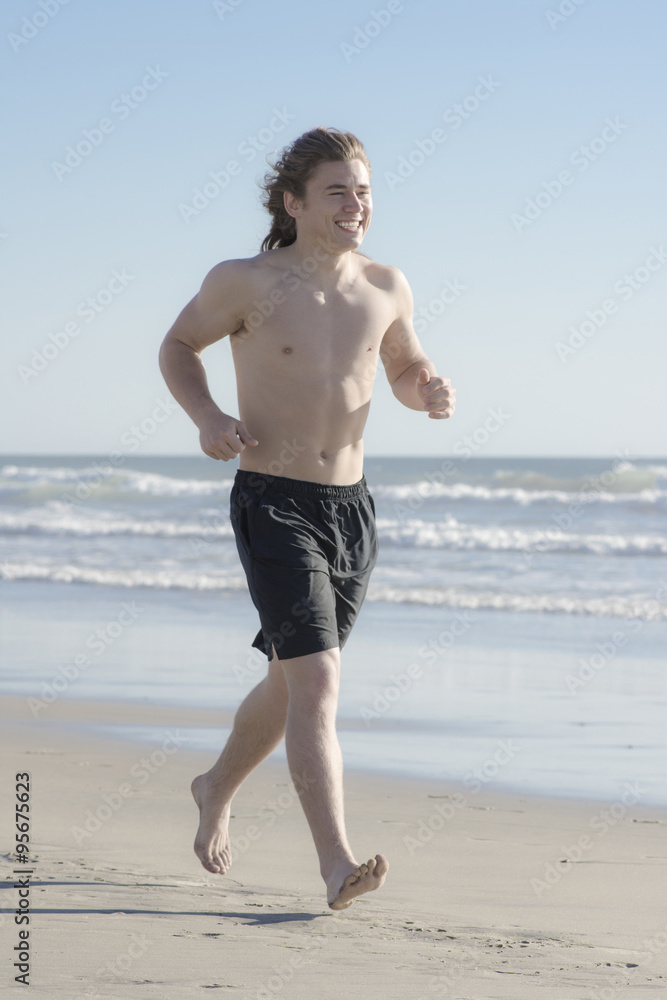 Male Running On The Beach Male Running On The Beach