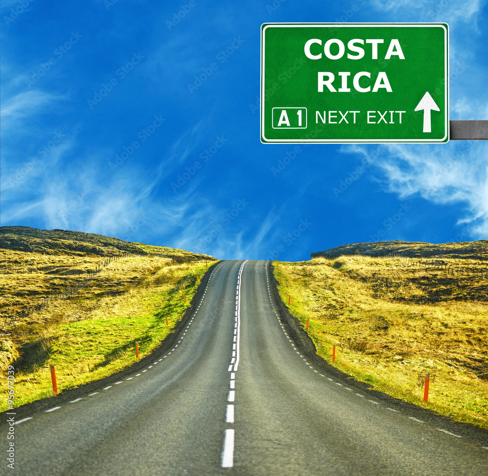 COSTA RICA road sign against clear blue sky
