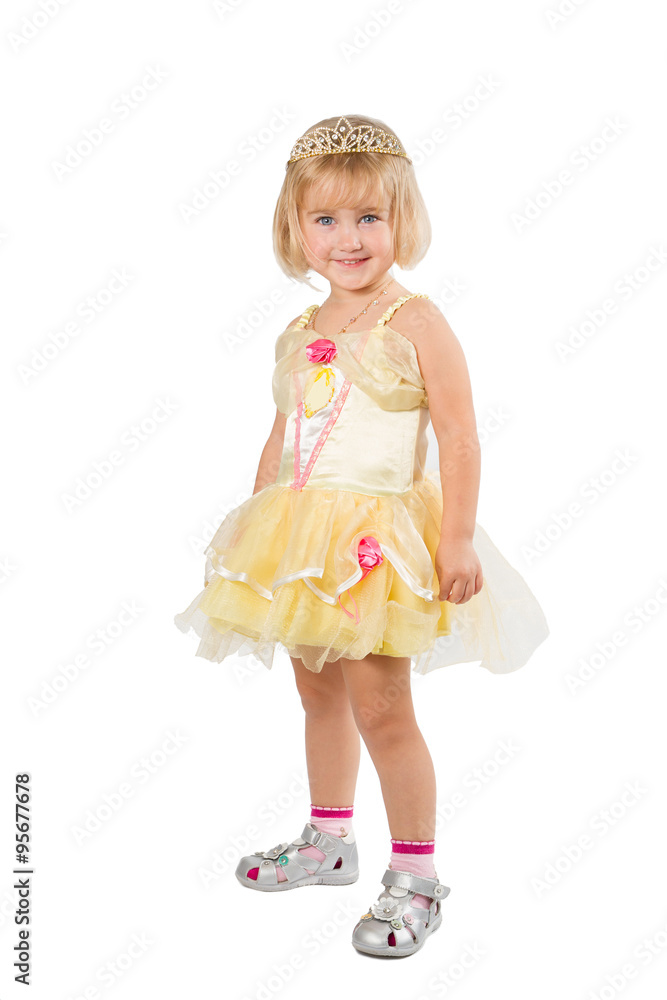 Little girl in a beautiful yellow dress and crown on white back Little girl in a beautiful yellow dress and crown on white back