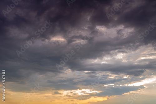 storm clouds at sunset © Satit _Srihin
