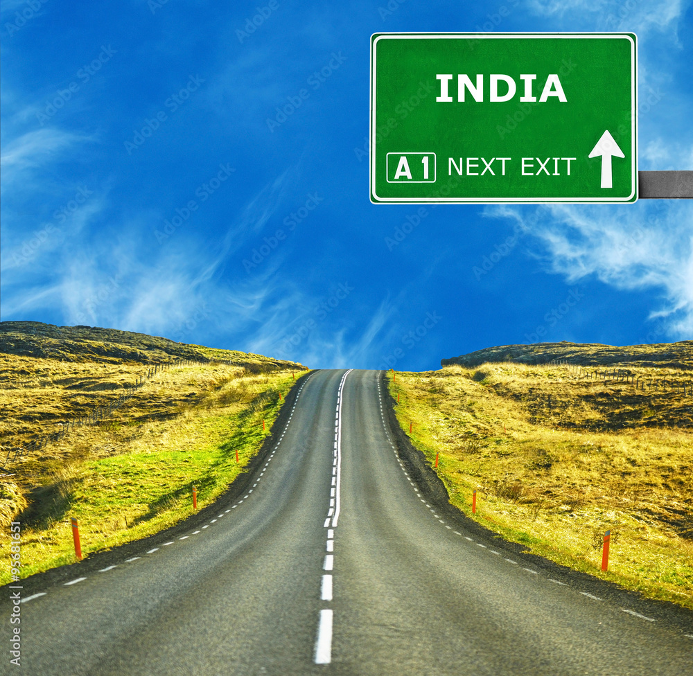 INDIA road sign against clear blue sky
