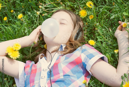 toned portrait of a happy teen girl summer day photo