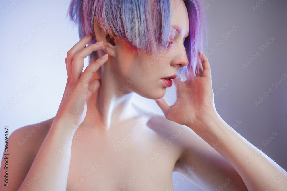 Fototapeta premium young girl with pink eyes and hair, like a doll