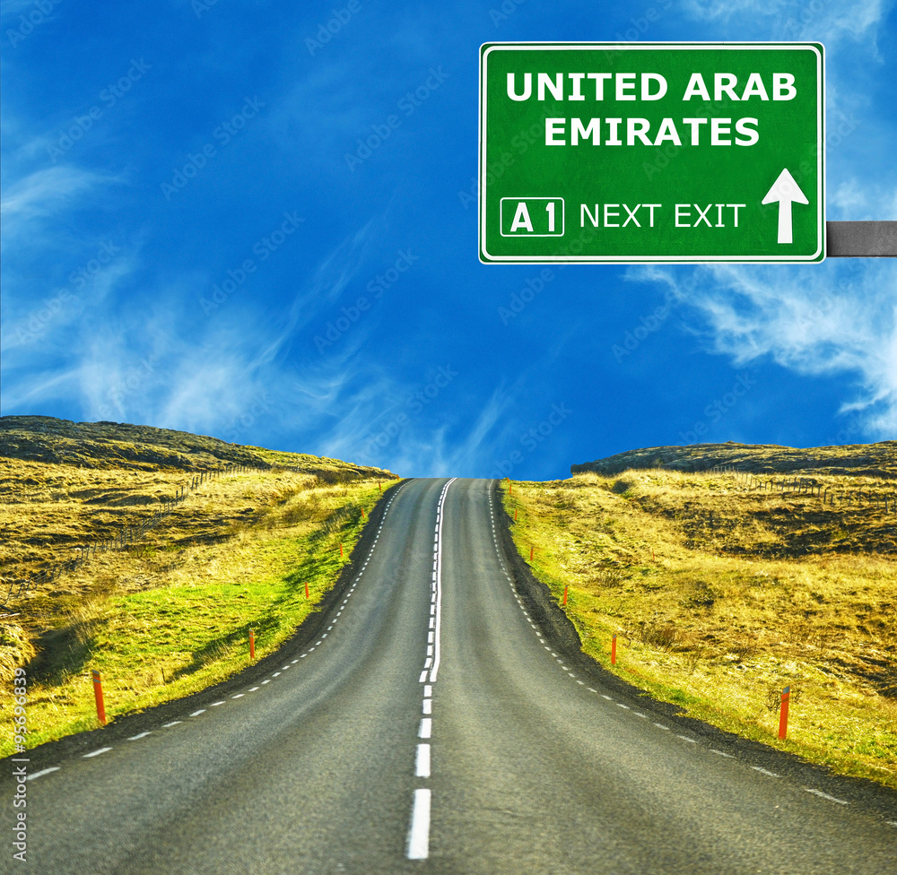 UNITED ARAB EMIRATES road sign against clear blue sky