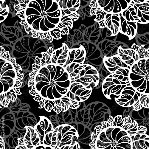 seamless pattern of abstract white flowers on a black background