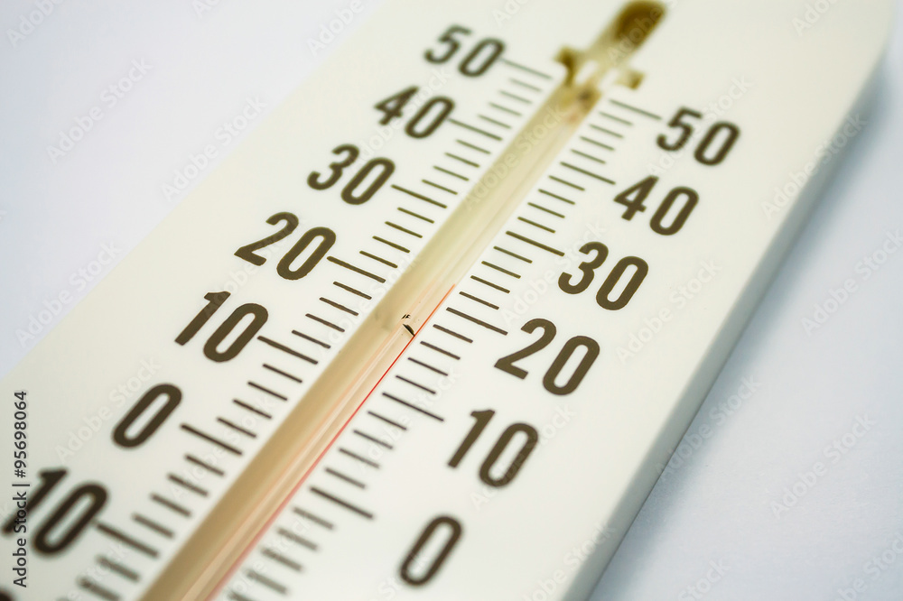 Closeup photo of household alcohol thermometer showing temperatu Closeup photo of household alcohol thermometer showing temperatu