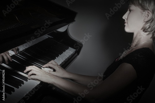 Grand piano player pianist playing