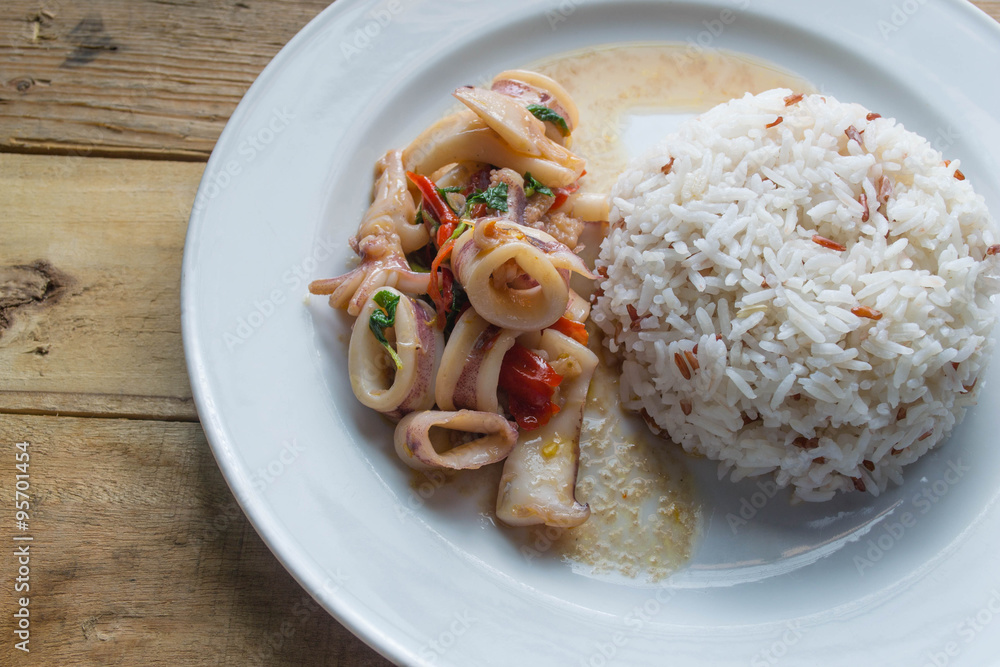 Thai fried squid in basil sauce and rice Thai fried squid in basil sauce and rice