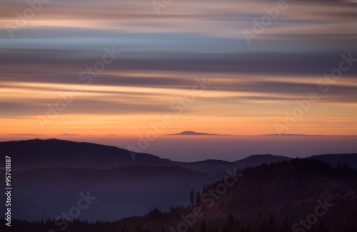 sunset over fog in Black Forest, Germany