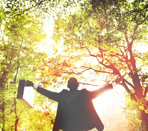 Business Man Arms Oustretched Forest Green Concept photo