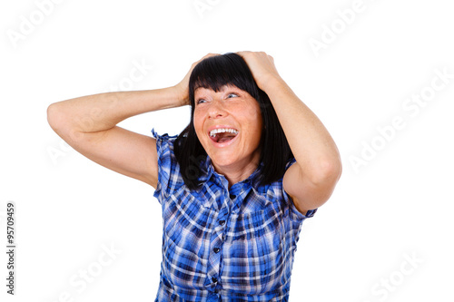 Happy and surprised smiling, woman 40 years old hold head by hands, mouth open with white teeth, isolated over white background, Winner woman with success, positive human emotion, facial expression