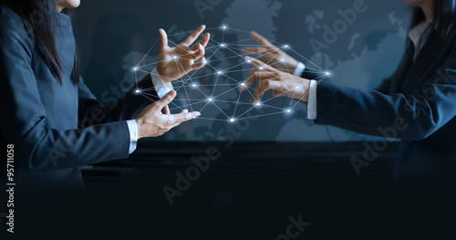 hands of businesswoman weaving virtual business network