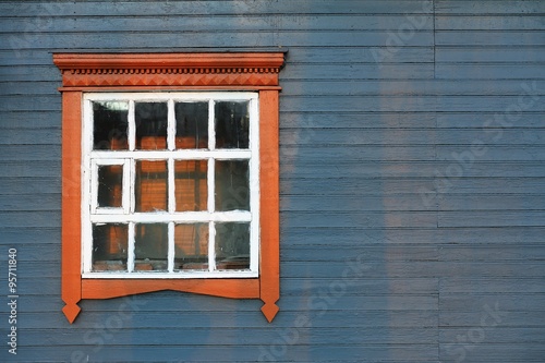 Blue grey wooden house wall with big window coyspace photo