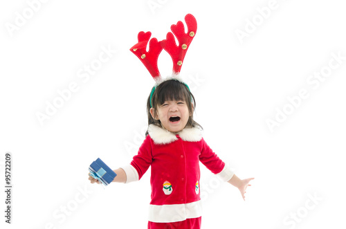 boy wearing Santa Claus uniform