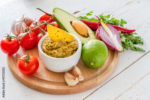 Guacamole sauce and ingredients