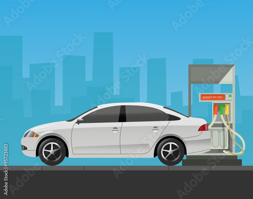 Gas station with car in city background.