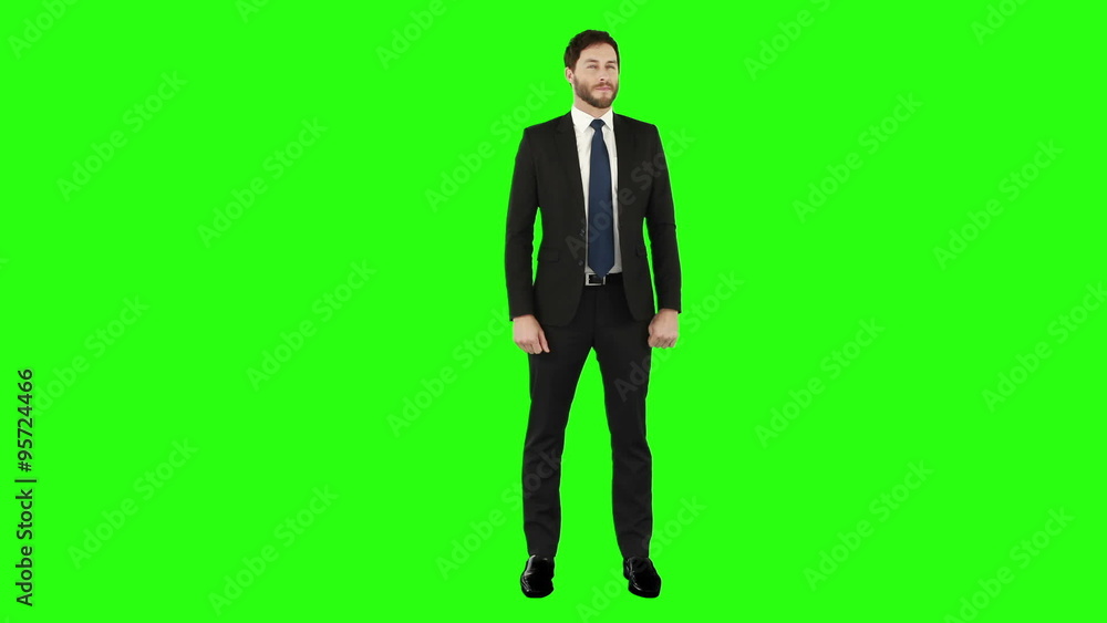 Standing businessman looking arond Standing businessman looking arond